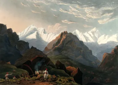 View of the mountains; a man pointing to the far distance as others sit around a fire