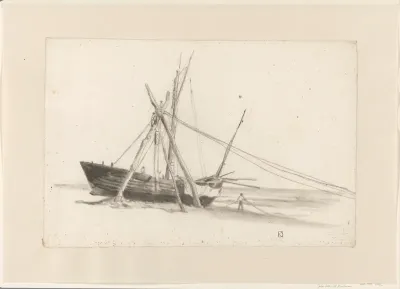 Vissersboot en takelwerk op het strand