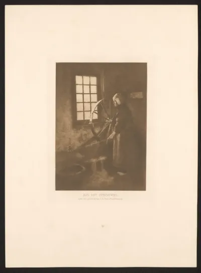 Vrouw bij een spinnewiel