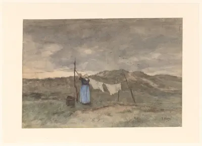 Vrouw bij een waslijn in de duinen