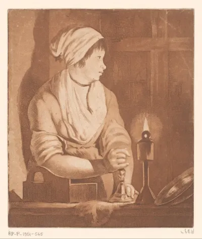 Vrouw bij kaarslicht
