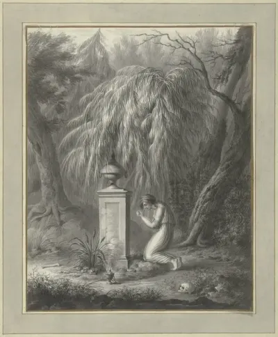 Vrouw knielend voor een grafmonument