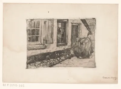 Vrouw met een wastobbe voor een huis in Heerde
