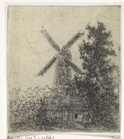 Windmolen achter een hut