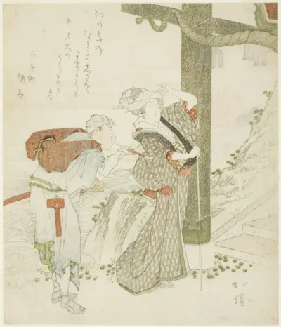 Woman and attendant at entrance gate of Enoshima