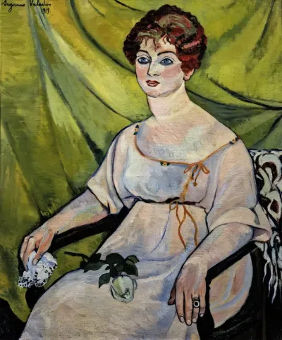 Woman in an armchair. Portrait of Madame G.