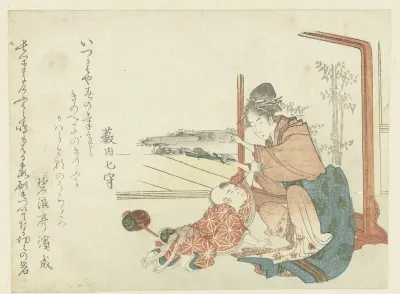 Woman Playing with a Young Boy