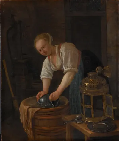 Woman scouring metalware