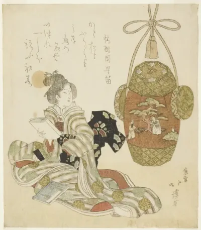 Woman with book sitting next to a New Year pull toy