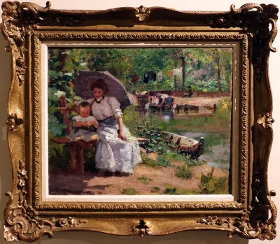 Woman with child sitting in a wood