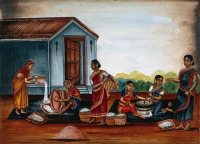 Women grinding and sieving grain into flour