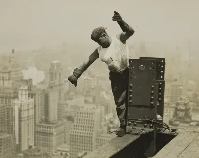 Worker Giving High-Signal to the Derrick Crew