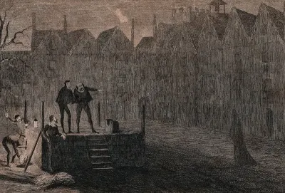 Workmen prepare the scaffold for an execution at night with one workman pointing at a ghostly figure dressed in black rushing past the block
