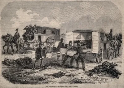 Wounded soldiers being taken to hospital by ambulance