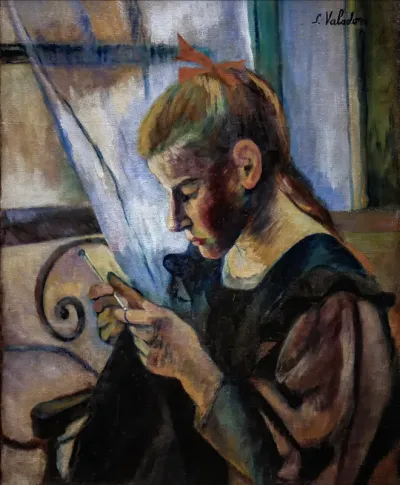 Young girl crocheting