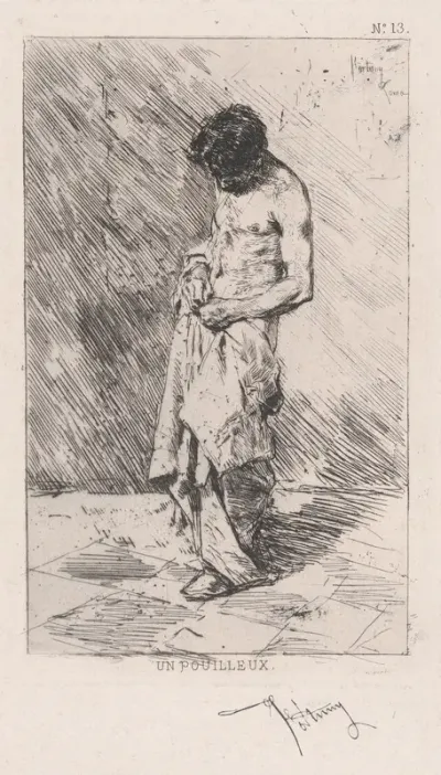Young man standing dressed in rags