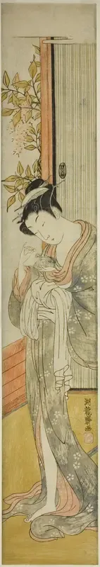 Young Woman Feeding a Rat