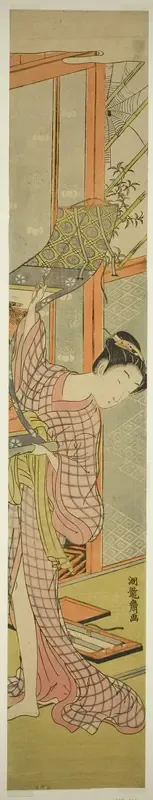Young Woman Hanging a Painting