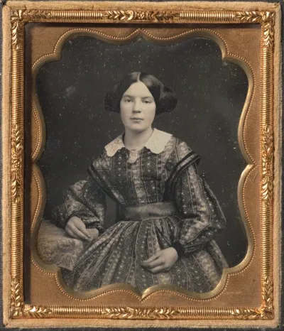 Young Woman in a Patterned Dress