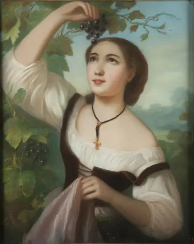 Young woman picking grapes