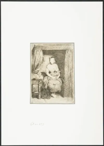 Young woman sitting on a bed