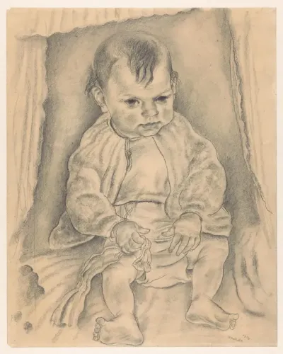 Zittende baby met een lap in de hand