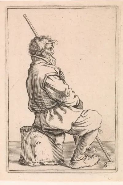 Zittende man met lange stok