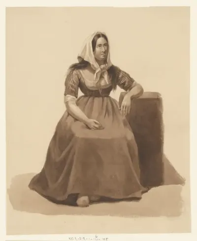 Zittende vrouw