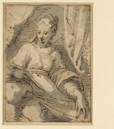 Zittende vrouw met een boek