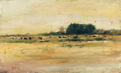 A Herd Of Cattle In A Meadow
