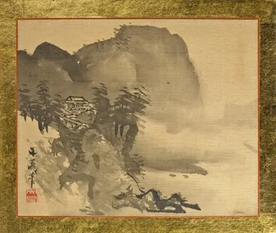 A House On A Cliff With Mountains In The Background