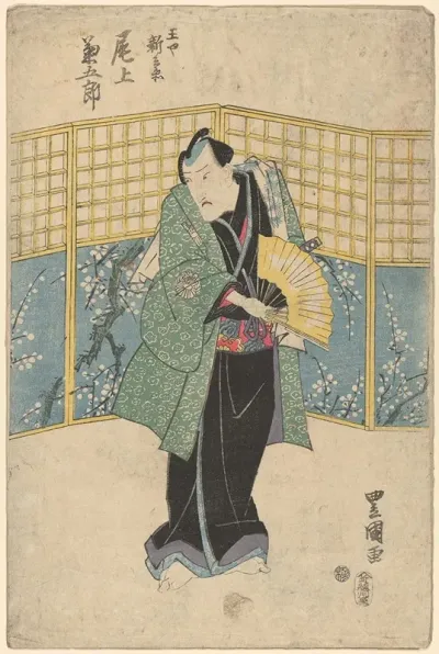 Actor In Green Robe With Yellow Fan