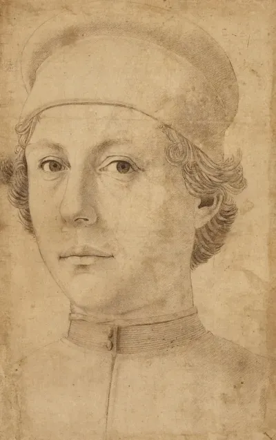 Portrait Of A Young Man Head And Shoulders Wearing A Cap