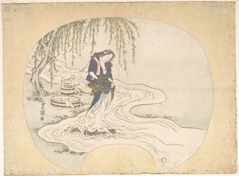 A Woman Stands on a Rock in a Stream Washing Clothes