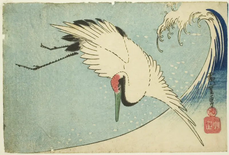 Crane flying over wave