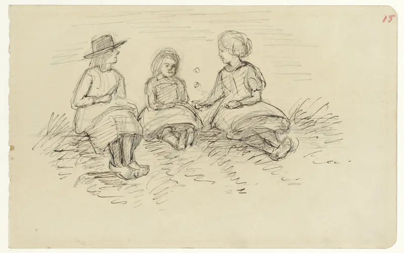 Drie zittende kinderen in het gras