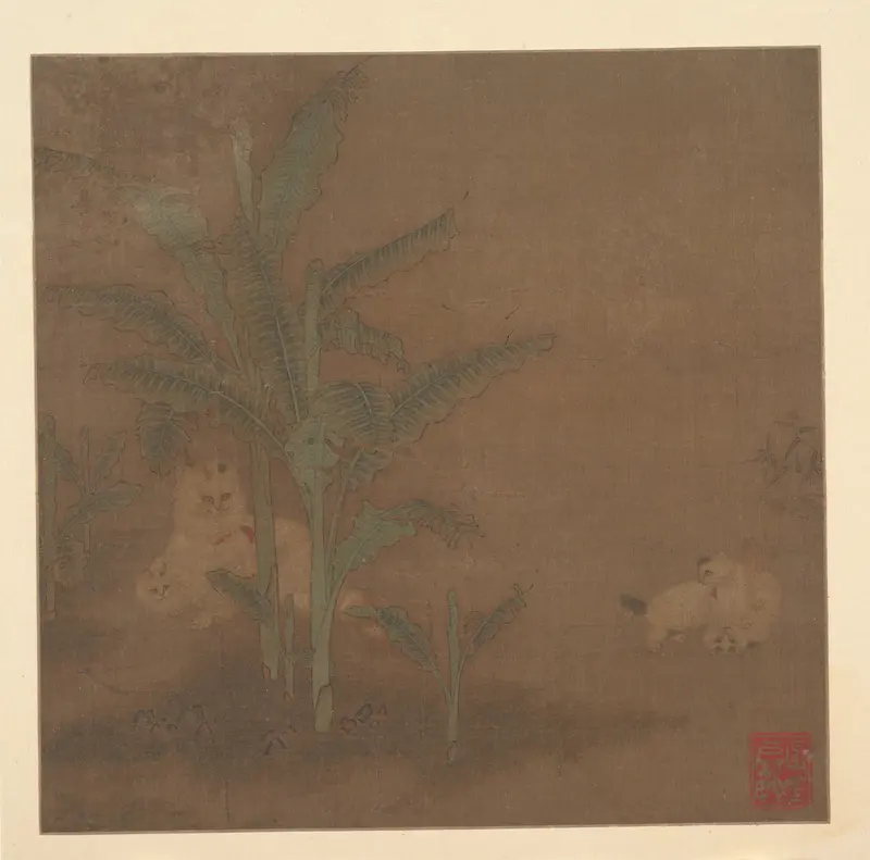 Frolicking Kittens under a Banana Tree