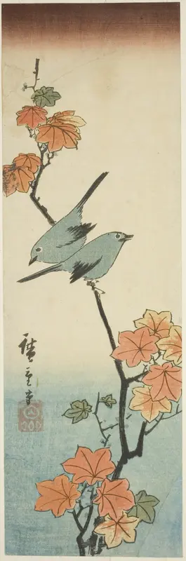 Japanese white-eyes on a maple branch
