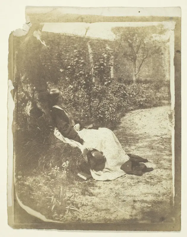Mrs. Craik Reclining in Garden with Hat and Book Wall Art by Unknown - High-Resolution Digital Print