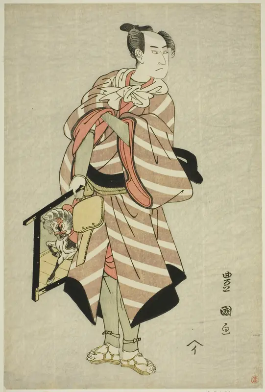 The actor Sawamura Sojuro III as the packhorse-man Muchizo in the play "Miyamairi Musubi no Kamigaki," performed at the Kiri Theater in the eleventh month, 1797