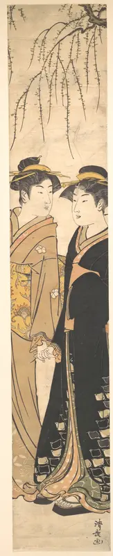 Two Tall Young Women Walking Hand in Hand