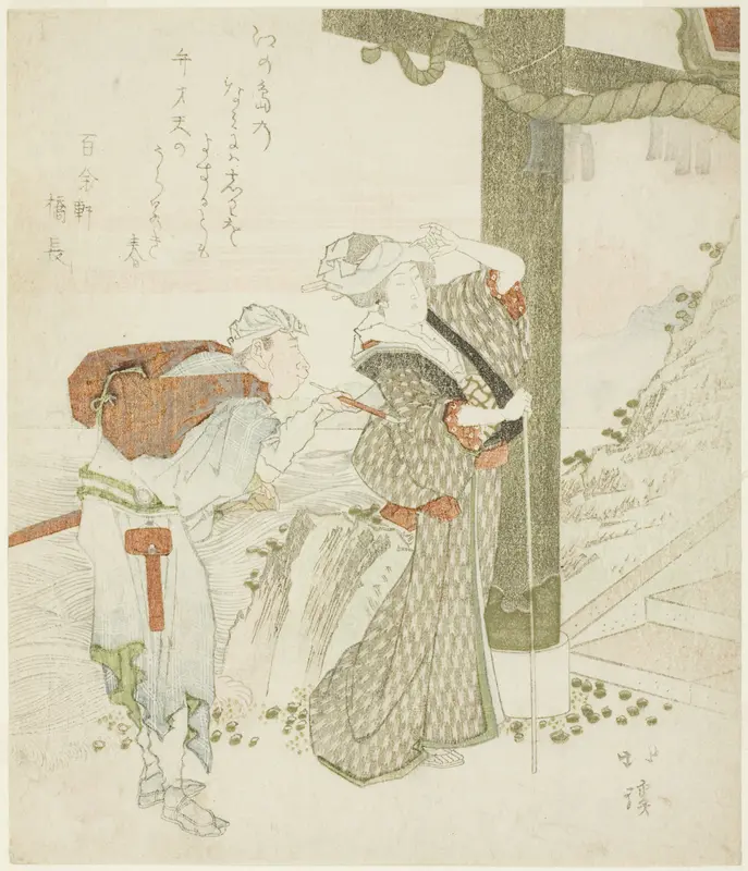 Woman and attendant at entrance gate of Enoshima