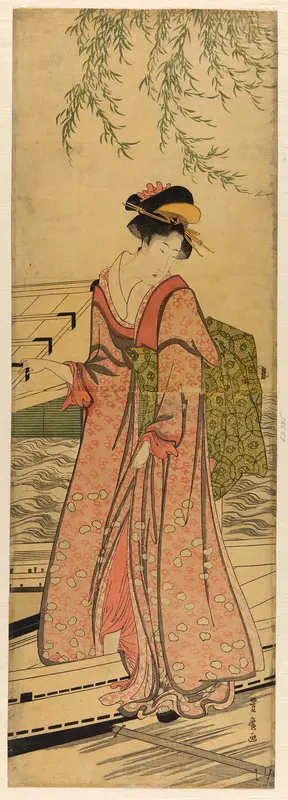 Young woman stepping out of a boat