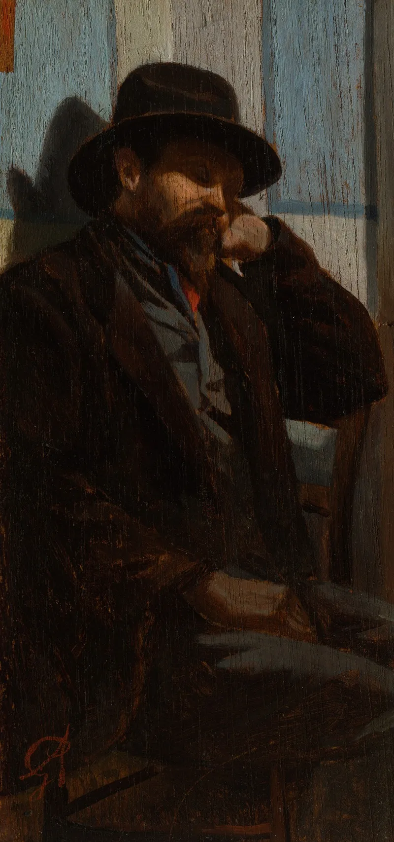 A Man Seated And Asleep