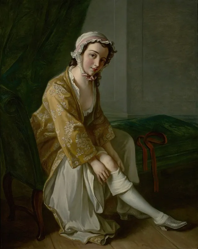 A Young Woman Pulling On Her Stocking