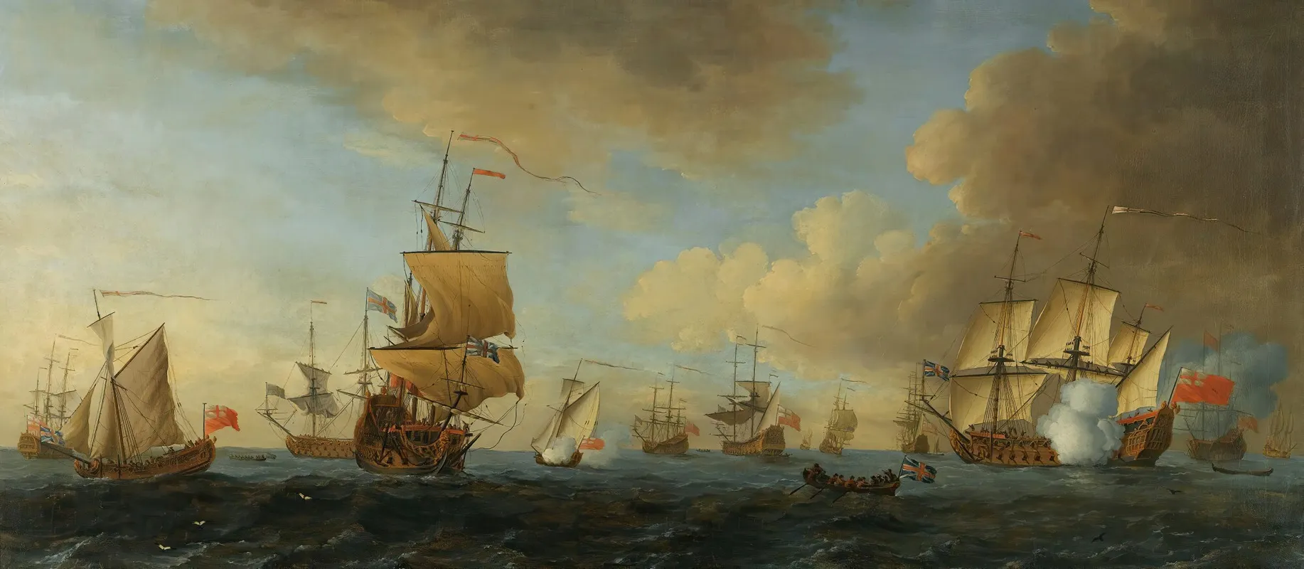 An English Frigate Under Sail Firing A Gun With Shipping At Anchor And Under Sail by John Cleveley the elder - Canvas Print