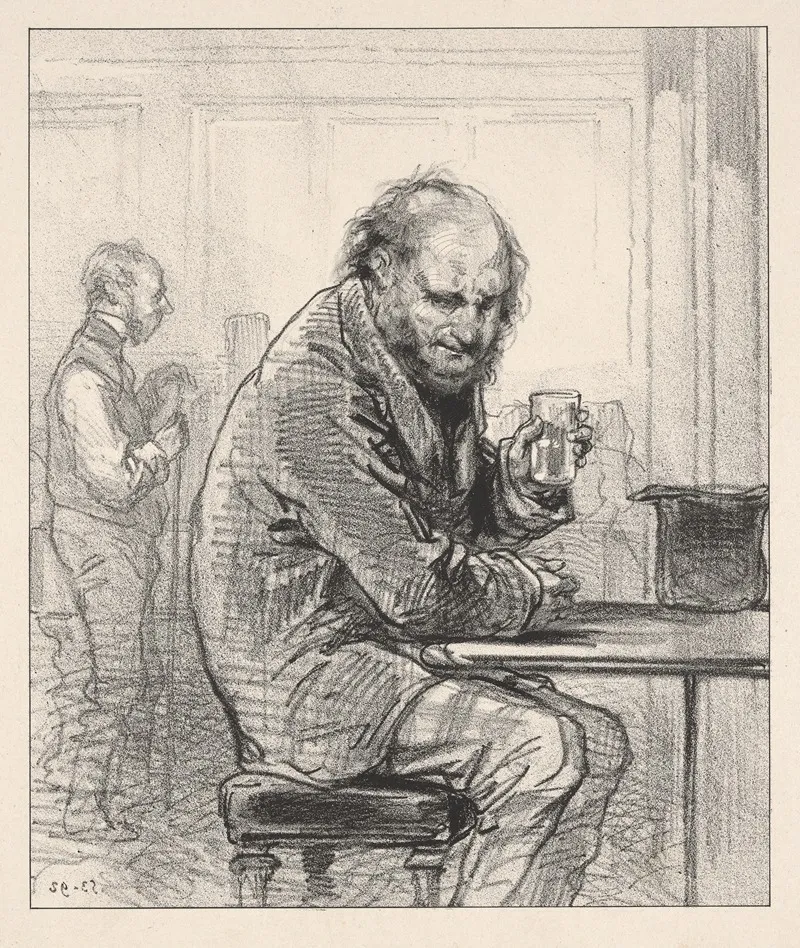 Man Seated At Table Holding Drink