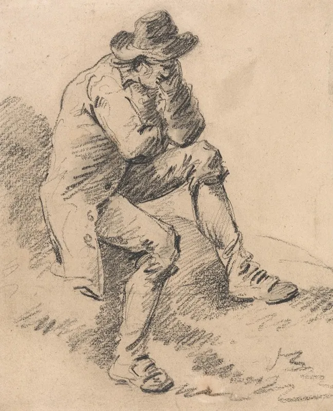 Man Seated On A Bank