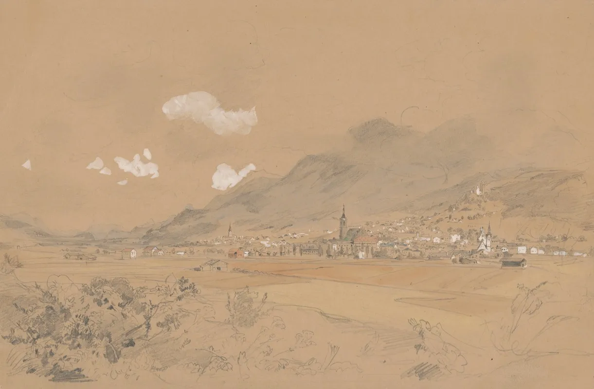 View Of A Village Below The Mountains